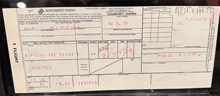 Bill Mitchell's passenger ticket for that flight from Portland to Seattle on Nov. 24, 1971, is a piece of history. (cllct photo by Darren Rovell)